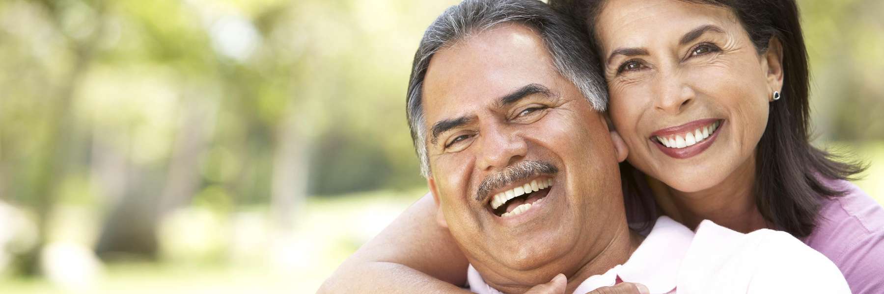 A husband and wife hugging