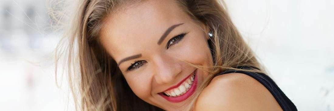A smiling woman outside | Winchester KY dentist