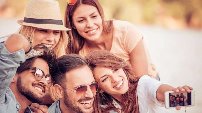 A group of friends taking a selfie | dentist Winchester