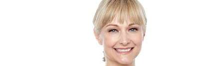A smiling woman | dentist near me