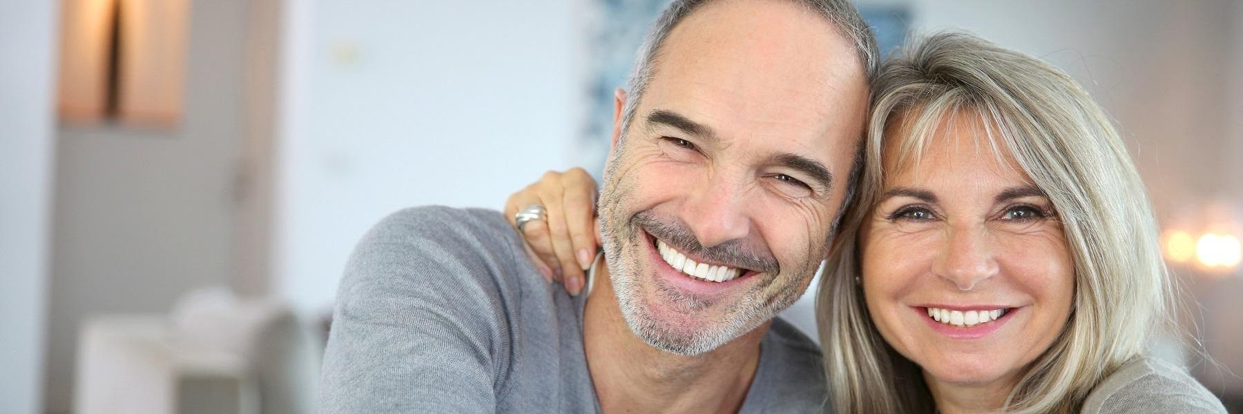 couple smiling after preventive dental check up